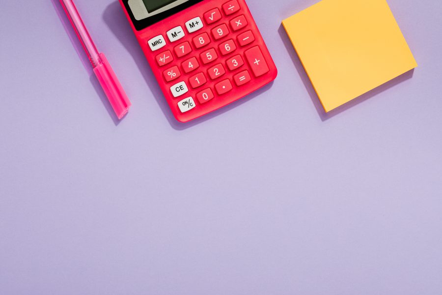 Calculator, pen and notepad