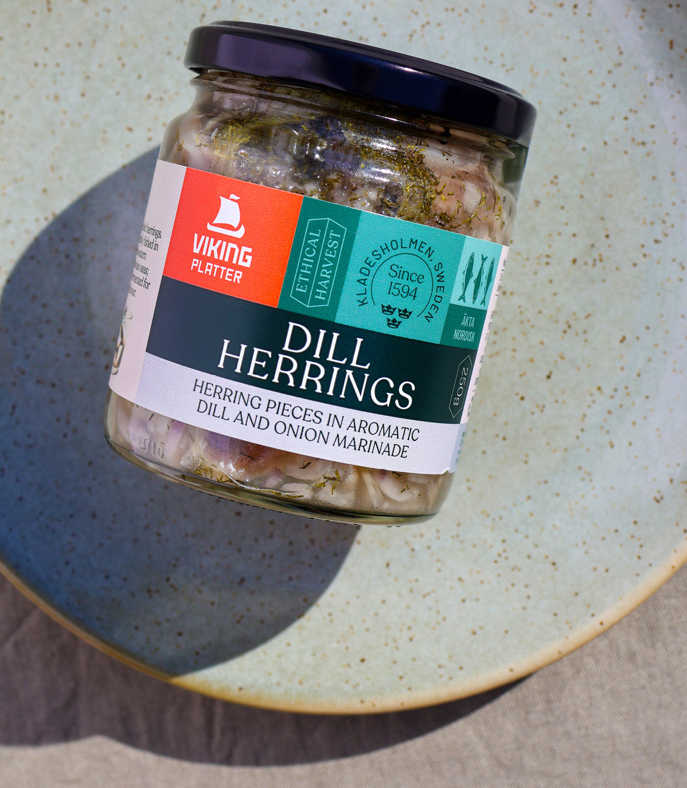 Front of packaging for Viking Imports Pickled Dill Herrings