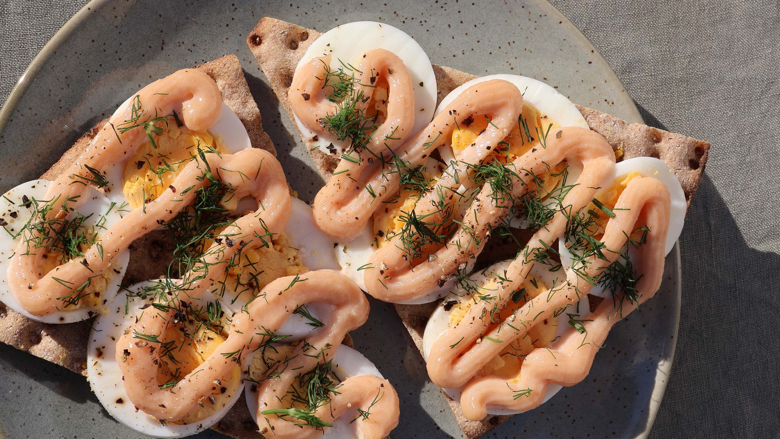 Platter of crackers topped with Viking Imports Cod Roe Creme