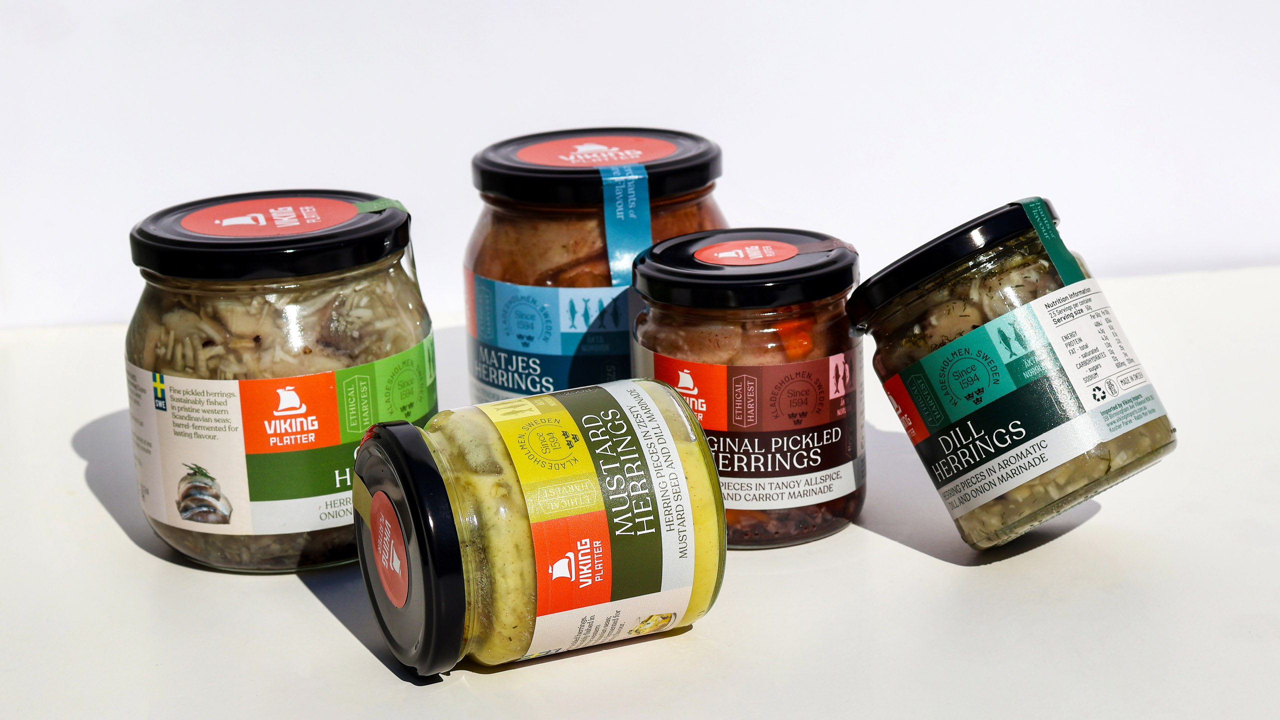 Five varieties of packaging for Viking Imports Pickled Herrings